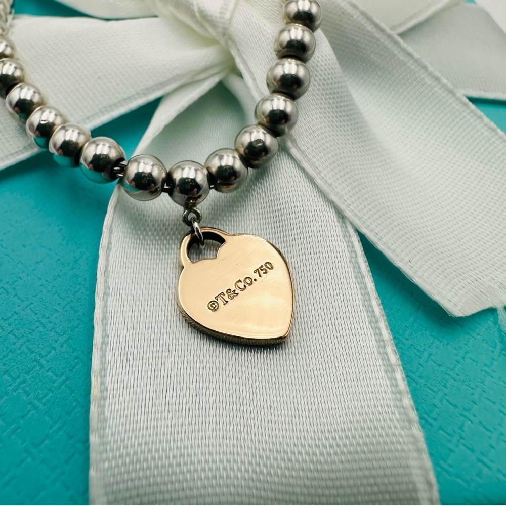 Return to Tiffany & Co. 4 mm Heart Tag Bead Bracelet in Silver & Rose Gold - Picture 6 of 14